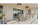 Outdoor patio with ceiling fans, brick flooring, dining table set and a built in outdoor kitchen area at 7928 Hanson Bay Pl, Kissimmee, FL 34747