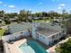 Aerial view of the backyard showcasing the pool, patio, and lush greenery, creating a private oasis for outdoor enjoyment at 812 Arlington Blvd, Altamonte Springs, FL 32701