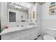 All-white bathroom with vanity, sink, and tile accents at 812 Arlington Blvd, Altamonte Springs, FL 32701