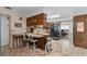 Eat-in kitchen with wood cabinetry, tile floors, and breakfast bar seating at 812 Arlington Blvd, Altamonte Springs, FL 32701