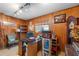 Office featuring wood paneling, desk, and natural light at 812 Arlington Blvd, Altamonte Springs, FL 32701