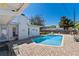 Beautiful backyard featuring a refreshing pool, lush green grass, and a brick patio perfect for outdoor living and leisure at 812 Arlington Blvd, Altamonte Springs, FL 32701