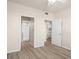 Bedroom doorway showing bathroom, kitchen, and light wood flooring at 911 N Orange Ave # 447, Orlando, FL 32801