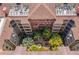 An inviting courtyard featuring lush landscaping and a relaxing atmosphere from an aerial perspective at 911 N Orange Ave # 447, Orlando, FL 32801