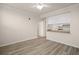 Inviting living room with a view into a breakfast bar and kitchen, creating a cozy living space at 911 N Orange Ave # 447, Orlando, FL 32801