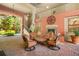 Cozy outdoor patio with comfortable seating and a charming fireplace feature at 911 N Orange Ave # 447, Orlando, FL 32801