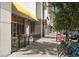 Inviting street featuring businesses, sidewalk dining, and convenient bike rentals at 911 N Orange Ave # 447, Orlando, FL 32801