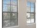 Two bright windows offer an exterior view at 911 N Orange Ave # 447, Orlando, FL 32801