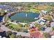 Breathtaking aerial view of community lake with fountain, walking trails, and gathering spaces at 927 City Walk Ln, Oviedo, FL 32765
