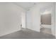 Bright bedroom featuring neutral tones, carpet flooring, and ensuite bathroom access at 927 City Walk Ln, Oviedo, FL 32765