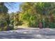 Entrance to tree-lined community path at 927 City Walk Ln, Oviedo, FL 32765
