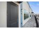 Unit 926 modern facade with a dark-colored front door and large windows at 927 City Walk Ln, Oviedo, FL 32765