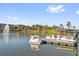 Charming swan paddle boats docked on the lake with the lake's fountain in the background at 927 City Walk Ln, Oviedo, FL 32765