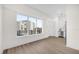Open-concept living space with large window overlooking the balcony and city views at 927 City Walk Ln, Oviedo, FL 32765