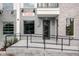 Ground floor office entrance with accessible ramp and modern lighting in a well-maintained building at 927 City Walk Ln, Oviedo, FL 32765