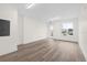 Modern office space with neutral colors, new hardwood floors, and plenty of room for customization at 927 City Walk Ln, Oviedo, FL 32765