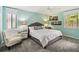 Charming bedroom with great natural light, ceiling fan, and comfortable sleeping area at 106 Waterwood Dr, Yalaha, FL 34797