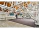 Spacious clubhouse interior featuring a wooden ceiling, neutral walls, and ample seating at 106 Waterwood Dr, Yalaha, FL 34797