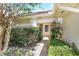 Front entrance with a well manicured front yard leading up to the front door at 1072 Weaver Dr, Oviedo, FL 32765