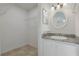 Bathroom featuring granite vanity top and a sink at 1101 S Thompson Ave, Deland, FL 32720