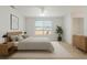 Serene bedroom with a comfortable bed, modern furnishings, and large window at 1101 S Thompson Ave, Deland, FL 32720