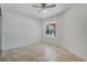 Neutral bedroom featuring natural light from window and ample space for furnishings and personalization at 1101 S Thompson Ave, Deland, FL 32720