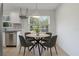 Cozy dining area featuring a round table and stylish chairs at 1101 S Thompson Ave, Deland, FL 32720