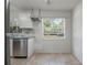 Efficient kitchen with stainless steel appliances and ample natural light at 1101 S Thompson Ave, Deland, FL 32720