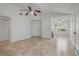 Spacious living room featuring an open layout and tile flooring throughout at 1101 S Thompson Ave, Deland, FL 32720