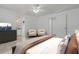 Spacious main bedroom with neutral tones, complemented by furniture and decor for a welcoming feel at 1101 S Thompson Ave, Deland, FL 32720