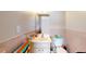 Cozy bathroom featuring a vanity with sink, toilet, and tiled walls at 1140 S Orlando Ave # F-3, Maitland, FL 32751