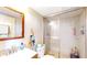 Bathroom featuring a glass-enclosed shower, vanity, and toilet at 1140 S Orlando Ave # F-3, Maitland, FL 32751