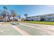 Exterior of the property showcasing a shuffleboard court, perfect for outdoor activities at 1140 S Orlando Ave # F-3, Maitland, FL 32751