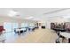 Spacious recreation room with tables, chairs, and lake view at 1140 S Orlando Ave # F-3, Maitland, FL 32751