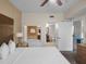 Well-appointed bedroom with ensuite bathroom and jacuzzi tub at 12544 Floridays Resort Dr # 102, Orlando, FL 32821