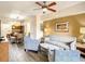 Inviting living room with modern furniture, warm lighting, and seamless flow to the dining area at 12544 Floridays Resort Dr # 102, Orlando, FL 32821