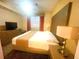 Comfortable hotel bedroom featuring a plush bed and modern amenities at 12544 Floridays Resort Dr # 102, Orlando, FL 32821