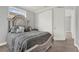 Bedroom with comfortable bed and view through to ensuite bathroom at 13628 Abberwick Dr, Orlando, FL 32832