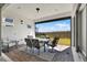 Covered patio with outdoor seating and view at 13628 Abberwick Dr, Orlando, FL 32832