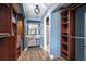Stylish bathroom with wood-look flooring, custom vanity, and storage solutions at 1404 Barcelona Ct, Winter Springs, FL 32708