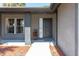 Welcoming front porch with stylish details, a decorative flower pot, and outdoor lighting at 1404 Barcelona Ct, Winter Springs, FL 32708