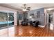 Cozy living room with sliding glass doors leading to the pool area at 1404 Barcelona Ct, Winter Springs, FL 32708