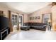 Bright living room with neutral decor, a cozy sectional sofa, and ample space at 1404 Barcelona Ct, Winter Springs, FL 32708