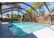 Relaxing pool area with screened enclosure and lush landscaping; enjoy Florida living at its finest at 1404 Barcelona Ct, Winter Springs, FL 32708