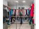 Mirrored closet with rods for organized clothing storage at 14399 Wabasso Loop, Winter Garden, FL 34787