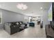 Inviting living room with tile flooring, recessed lights and open floor plan at 14399 Wabasso Loop, Winter Garden, FL 34787