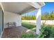 Cozy outdoor patio with brick flooring and a stainless steel sink, perfect for entertaining or relaxing outdoors at 14399 Wabasso Loop, Winter Garden, FL 34787