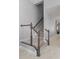 Classic staircase design with wood and white accents, complemented by light gray walls at 14399 Wabasso Loop, Winter Garden, FL 34787