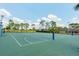 Well-maintained basketball court with multiple hoops, providing residents with ample space for sports and recreation at 14410 Lake Underhill Rd, Orlando, FL 32828