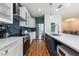 Well-equipped kitchen with stainless steel appliances and custom cabinetry at 14410 Lake Underhill Rd, Orlando, FL 32828